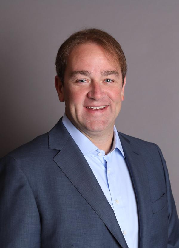 Portrait of John McQueeney